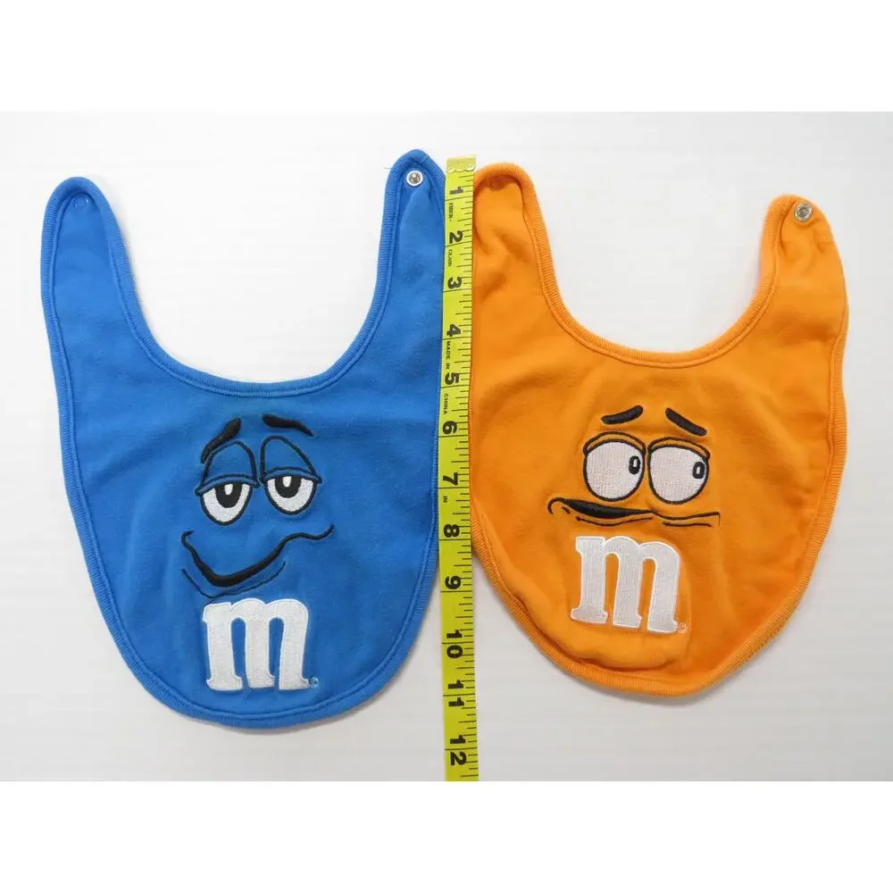 Set of 2 M&M Baby Bibs 100% Cotton Blue Orange Novelty Collectible Chocolate
